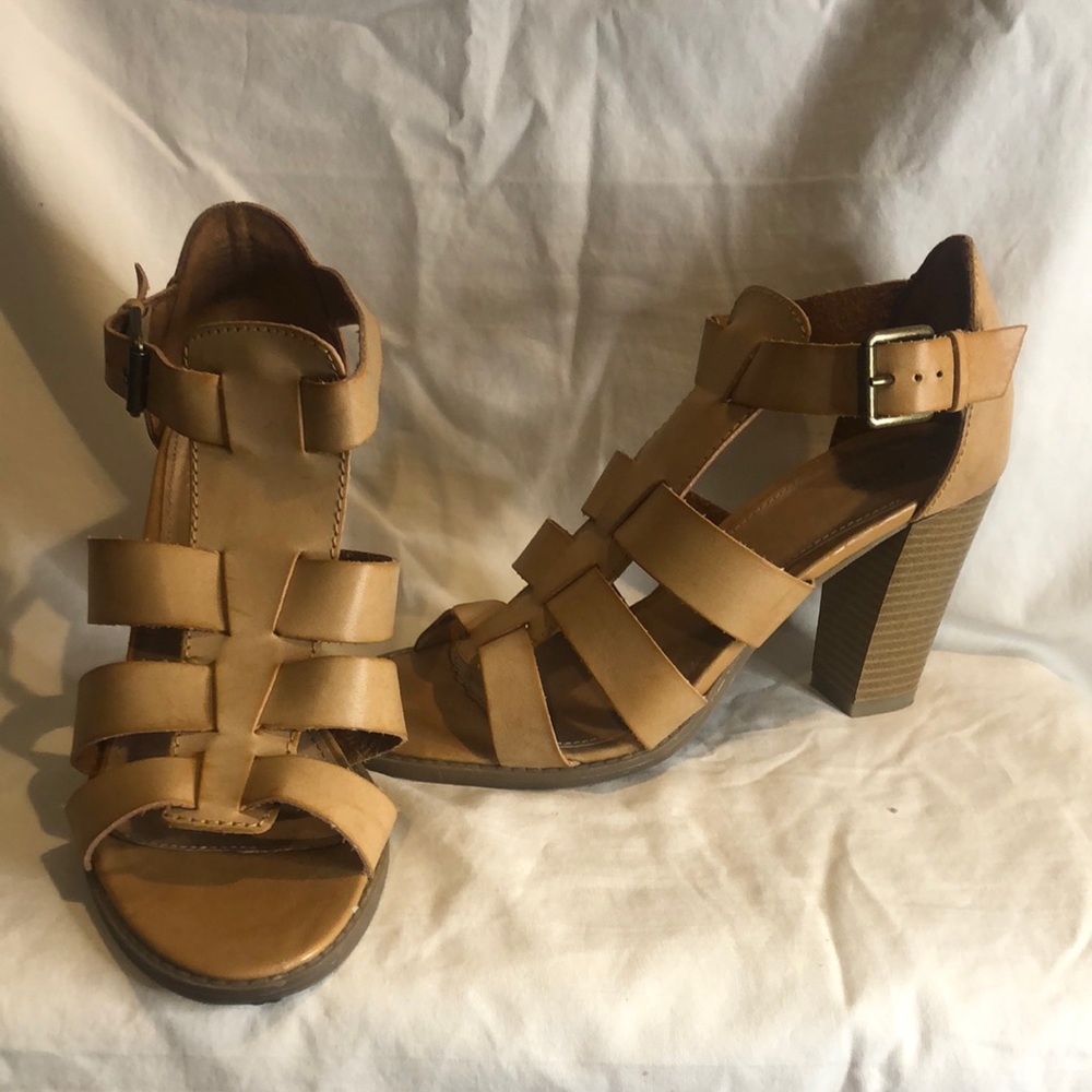 Strappy heels, stacked heel.